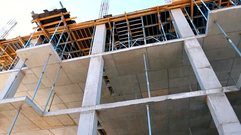 The process of creating a floor. Formwork flooring. Interior of a building under Stock Footage 212429862