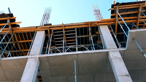 The process of creating a floor. Formwork flooring. Interior of a building under Stock Footage 212430104