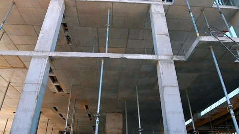 The process of creating a floor. Formwork flooring. Interior of a building under Stock Footage 212430127