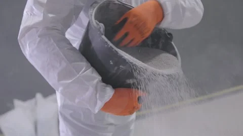 The process of creating a floor in a parking lot. The builder pours building Видео 202563408