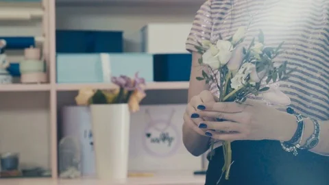 The process of creating a floral composition. Flower shop Stock Footage 73508102