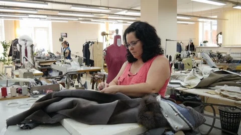 The process of creating a fur coat: sewing and cutting Stock Footage 103172821
