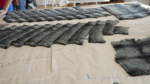 The process of creating a fur coat: sewing and cutting Stock Footage 103173403