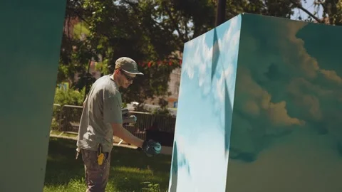 The process of creating graffiti, graffiti artist, graffiti artist's work Stock Footage 278305112