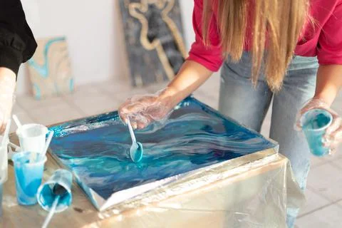 The process of creating a home-made trendy abstract modern pattern painted with Stock Photos