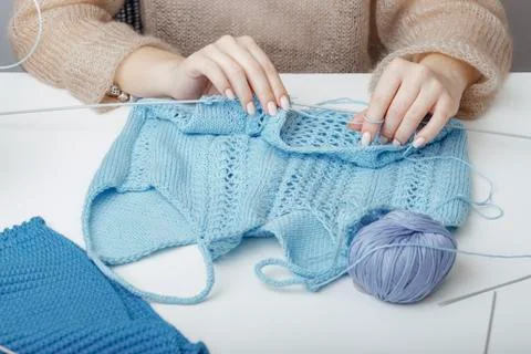 The process of creating knitted clothes for shop Stock Photos
