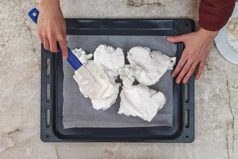 The process of creating meringue. The confectioner prepares the meringue Photos