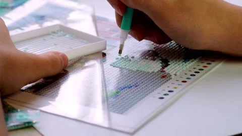 The process of creating a picture of rhinestones, mosaic. Stock Footage 168624287
