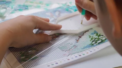 The process of creating a picture of rhinestones, mosaic. Stock Footage 168624292
