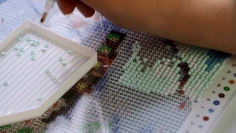 The process of creating a picture of rhinestones, mosaic. Stock Footage 168624311