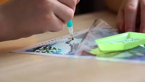 The Process Of Creating A Picture Of Rhinestones, Mosaic. Stock Footage 171315111