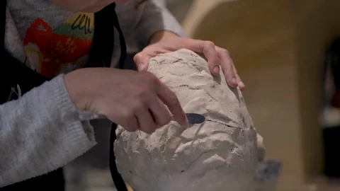 The process of creating sculpture. The sculptor is working. Stock-Footage 126772246