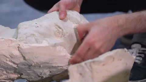 The process of creating sculpture. The sculptor is working. Stock-Footage 153144069
