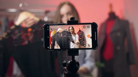 Process of creating social media content on smartphone, young influencer and Stock Footage 305041831