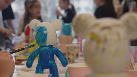 The process of creating a unique childrens toy through art therapy, where the Stock Footage 304228193