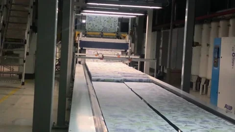 The process of creating wallpaper. Automated wallpaper production factory Video stock 208936340