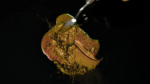 Process of creating watercolor using palette knife and pigment, black background Stock Footage 138801701