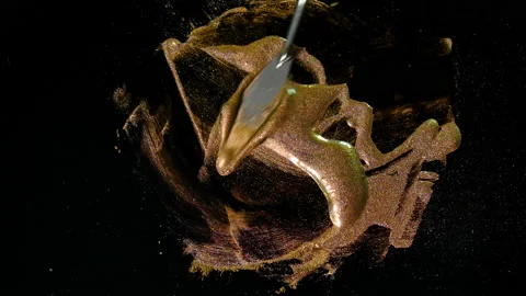 Process of creating watercolor using palette knife and pigment, black background Stock Footage 138805746