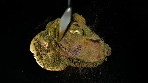 Process of creating watercolor using palette knife and pigment, black background Stock Footage 138806552