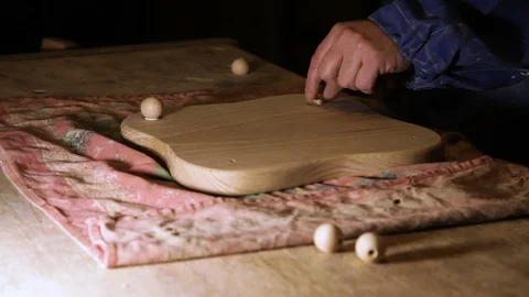 The process of creating wooden kitchen utensils in the carpentry workshop Stock Footage 100865866
