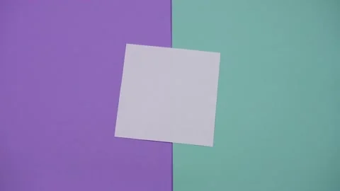 Process of creation origami bird in 4k stop motion animation. White sheet Stock Footage 130487000