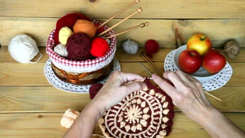 The process of crocheting a round woolen napkin Stock Footage 201730887