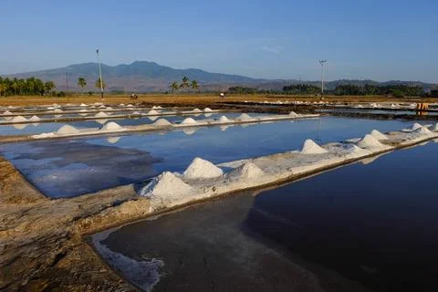 The process of crystallization of sea water into salt in the traditional wa.. Stock Photos