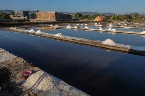The process of crystallization of sea water into salt in the traditional wa.. Stock Photos