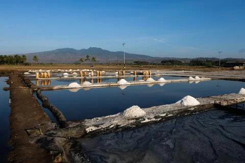 The process of crystallization of sea water into salt in the traditional wa.. Stock Photos