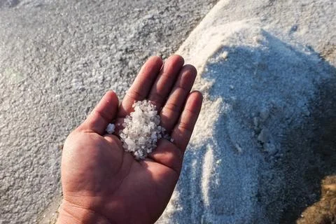 The process of crystallization of sea water into salt in the traditional wa.. Stock Photos