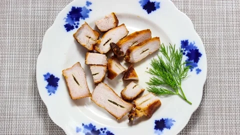 The process of cutting and eating cooked shish kebab, which lies on a plate. Stock Footage 152711175