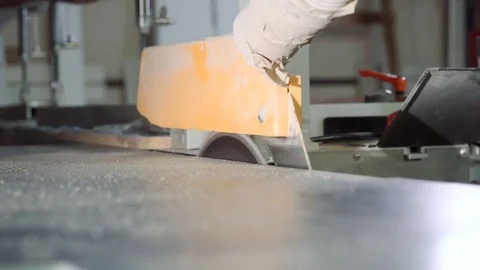 The process of cutting the chipboard on a machine close-up. Furniture Video stock 82688043