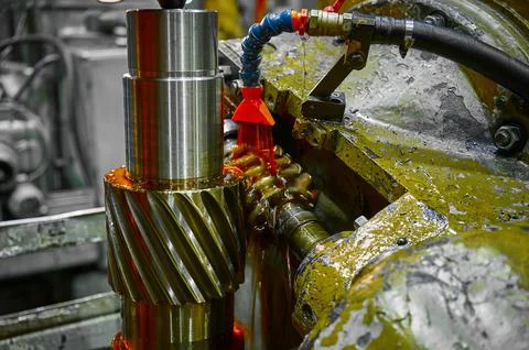 Process of cutting helical gear with modular hob cutter Stock Photos