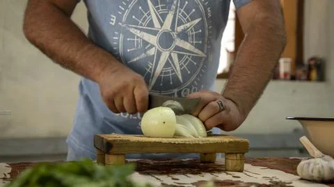 A process of cutting onion in pisces Fotos Stock