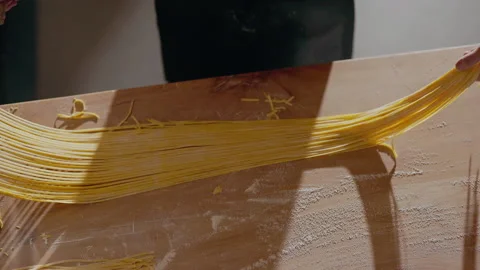 Process Of Cutting Own Made Pasta In Restaurant. Stock Footage 262665382