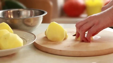 The process of cutting potatoes Stock Footage 229702444