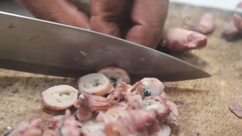 The process of cutting squid meat to make fried chili sauce. Stock Footage 275319342