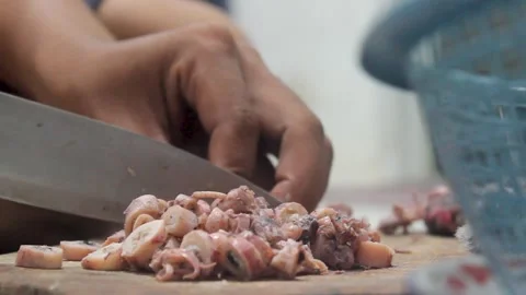 The process of cutting squid meat to make fried chili sauce. Stock Footage 276148473