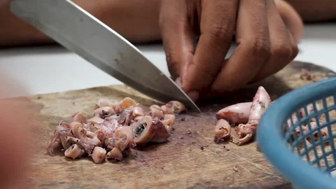 The process of cutting squid meat to make fried chili sauce. Stock Footage 276148777