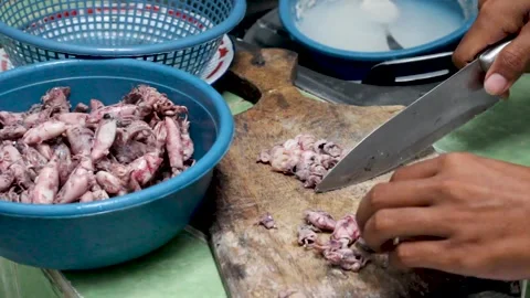 The process of cutting squid meat to make fried chili sauce. Stock Footage 276150066
