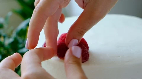 Process decorating berries cream cake. Stock Footage 113014888