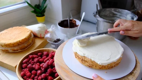 Process decorating berries cream cake. Stock Footage 113017131