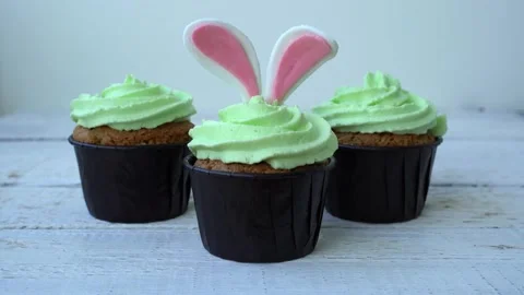 The process of decorating an Easter cupcake in the form of an Easter bunny Stock Footage 162852400