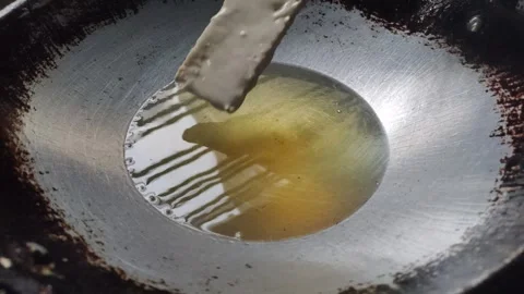 The Process of Deep-frying Tempeh Stock Footage 319723072