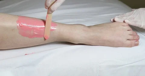 Process depilation female legs and hands Stock Footage 72828565