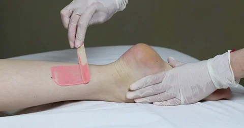 Process depilation female legs and hands Stock Footage 72828583