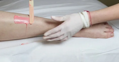 Process depilation female legs and hands Stock Footage 72828670