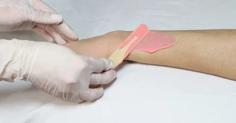 Process depilation female legs and hands Stock Footage 72828741