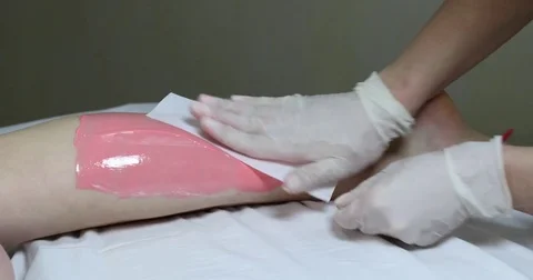 Process depilation female legs and hands Stock Footage 72828744