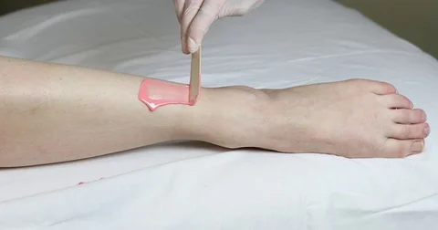 Process depilation female legs and hands Stock Footage 72828745